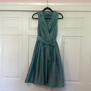 Shiny green circle skirt style dress.